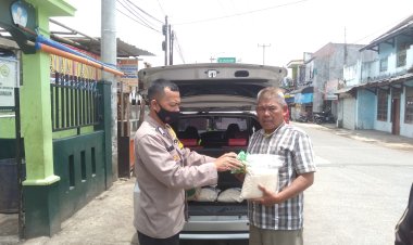 Bhabinkamtibmas Polsek Cibeureum Serahkan Bantuan Sembako