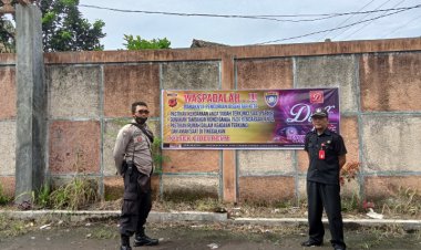 Pemasangan Spanduk Himbauan Harkamtibmas Oleh Bhabin Polsek Cibeureum