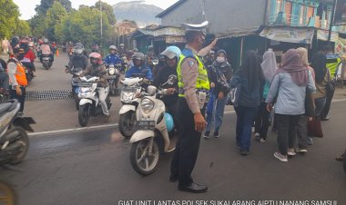 Berikan Kelancaran, Unit Lantas Polsek Sukalarang Laksanakan Gatur Pagi di Titik Rawan Kemacetan
