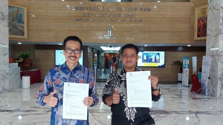 Soegiharto Santoso bersama Eddy Yusuf Prasetyo wartawan BISKOM saat mengantar surat ke Kemenkumham RI pada tanggal 11 Juli 2022.