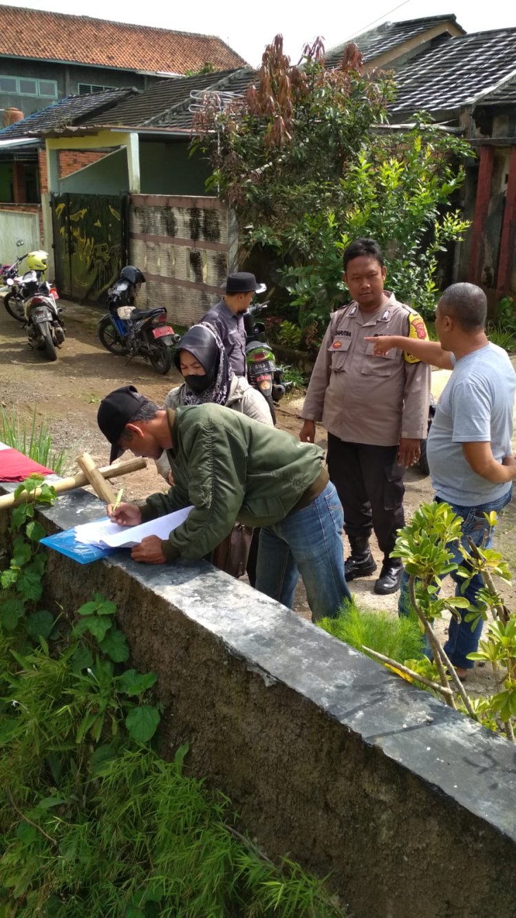 Bhabinkamtibmas Polsek Warudoyong Bersama Lurah Tinjau Pembangunan TPT