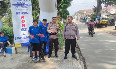 Personel Polsek Cireunghas, Laksanakan Pengamanan Promo Harga BBM Pom Mini