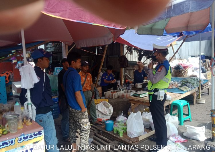 Unit Lantas Polsek Sukalarang Lakukan Dikmas Kepada Para Pedagang