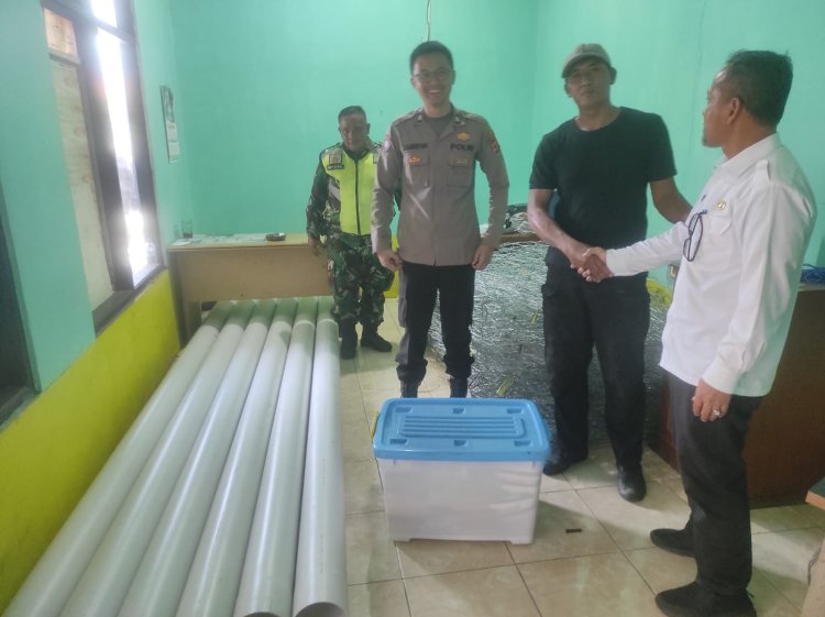 Bhabinkamtibmas Polsek Sukalarang Hadiri Giat Penyerahan Bantuan Dari BPBD