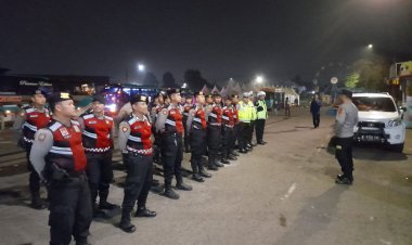 Kapolsek Warudoyong Pimpin Pengamanan Keberangkatan Apel Siaga Partai Nasdem