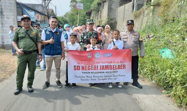 Sinergitas TNI -Polri, Bhabinkamtibmas dan Babinsa Amankan  Kegiatan Pawai Karnaval