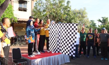 HUT Bhayangkara ke-78, Ribuan Peserta Geruduk Polres Pesawaran Ikuti Jalan Sehat dan Olahraga Bersama