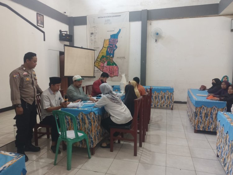 Bhabinkamtibmas Polsek Cisaat Monitoring Penyaluran Program Bantuan Pangan Cadangan Beras Pemerintah  (BPCBP)